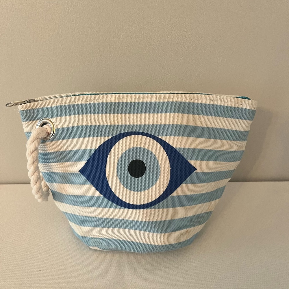 Striped Blue and White Pouch with Eye Design